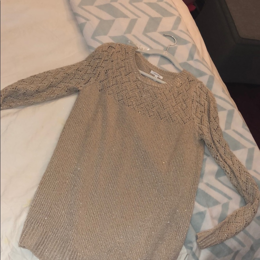 Maurice’s tan sweater